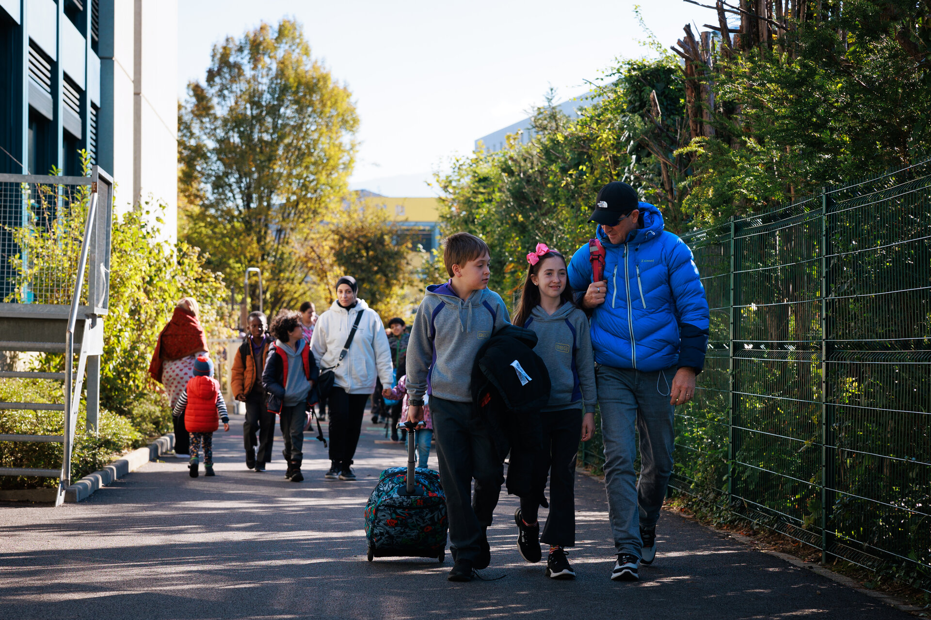 students and parents arriving at the school