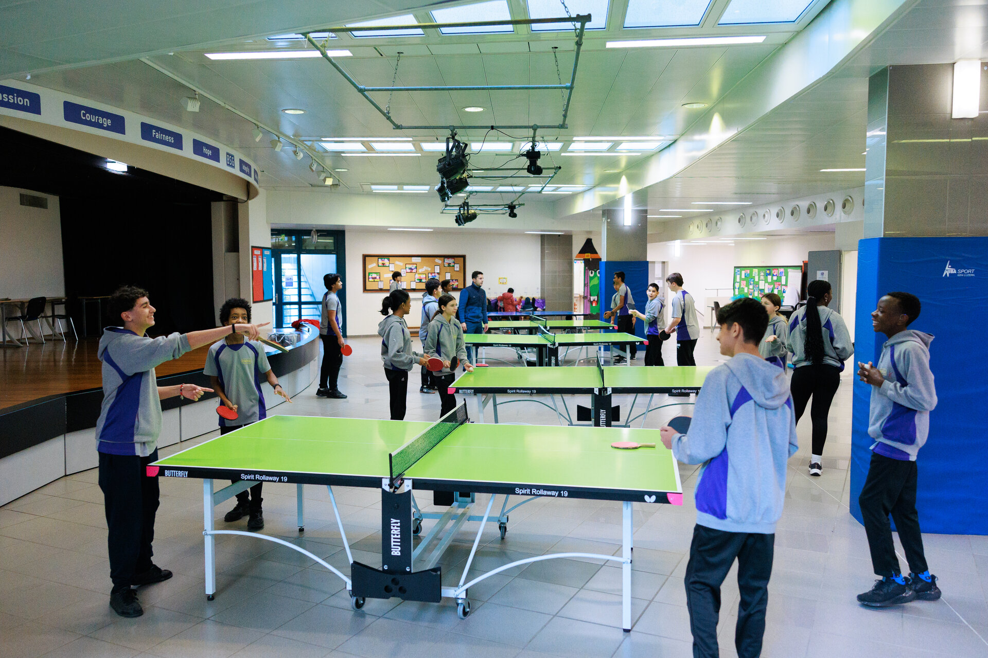 students playing table tennis