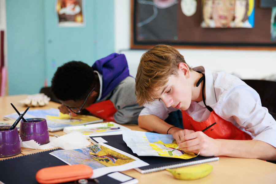 students painting
