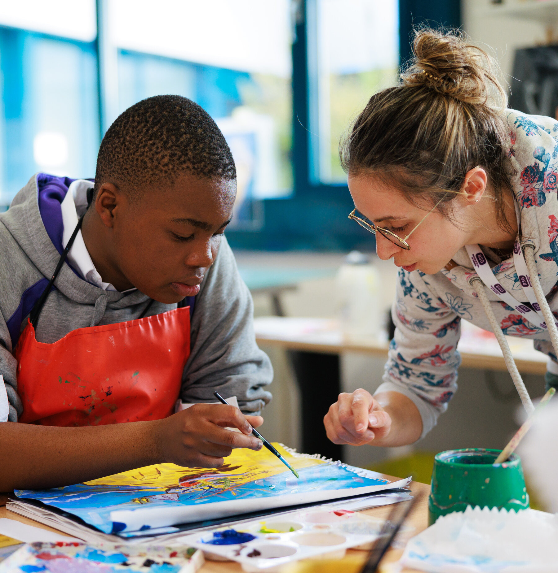 students painting