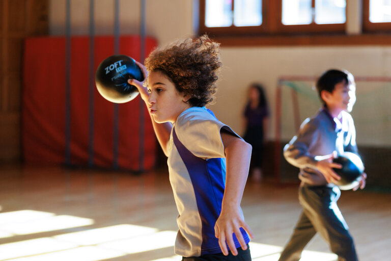 students playing with the balls