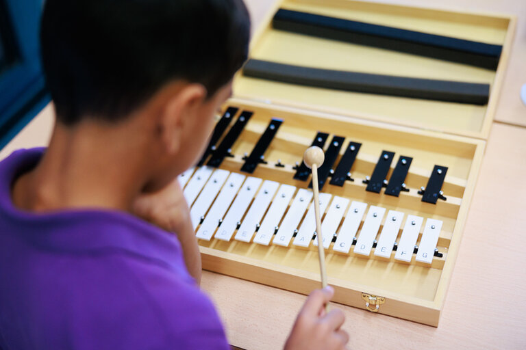 student playing the xylophone