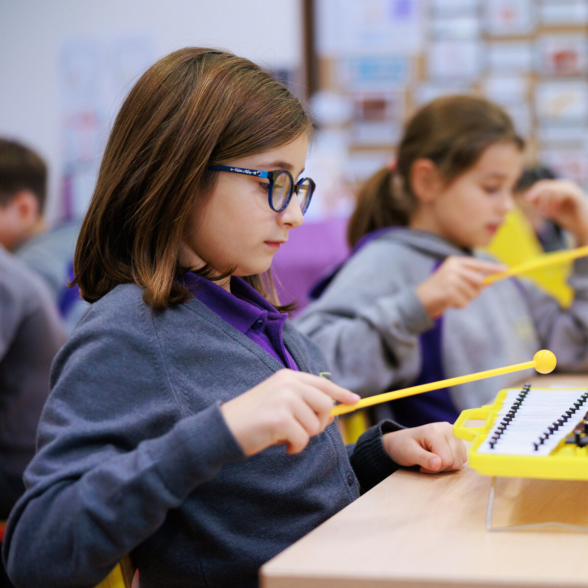 student playing the xylophone