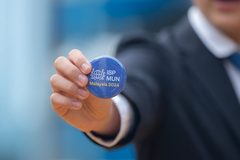Student holding an iSP pin 